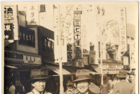 Two men standing in street (ddr-densho-426-19)