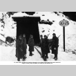 Group of soldiers in snow outside tunnel entrance (ddr-ajah-2-780)