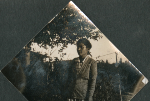 Woman standing in yard (ddr-densho-483-548)