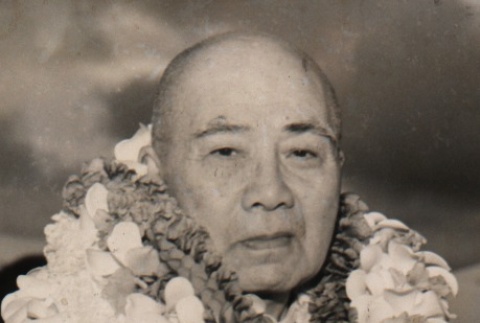 Chitoku Morikawa wearing leis (ddr-njpa-4-780)