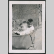 Photo of two children in a pram (ddr-densho-483-787)