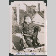 Toddler in wagon on sidewalk (ddr-densho-483-650)