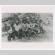 Seven figures seated outside (ddr-densho-1007-24)