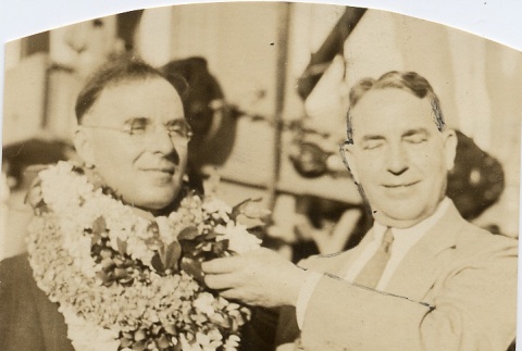 Man receiving leis (ddr-njpa-2-922)