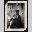 Roy reading a newspaper (ddr-densho-542-365)