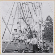 Three children on Ferris wheel (ddr-densho-522-328)