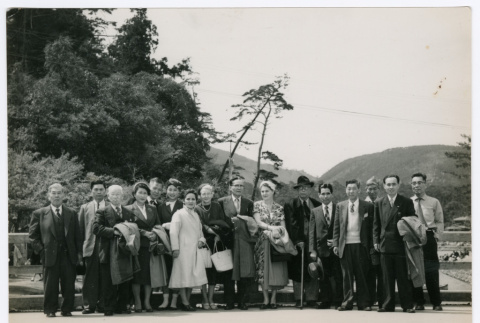 Mitsuye Yabe and Tour Group Posing Outside (ddr-ohs-1-128)
