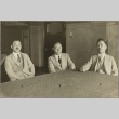 Three men sitting at a table (ddr-njpa-13-1262)