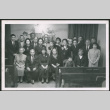 Group posing in front of mural in church (ddr-densho-293-192)