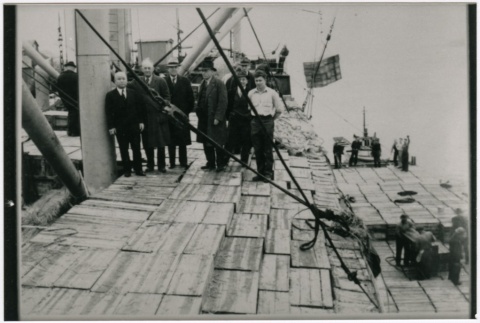 A group receiving a Maru shipment of oyster seeds (ddr-densho-353-164)