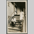 Man and woman pose on front steps (ddr-densho-359-619)