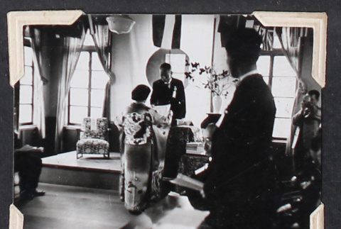 Woman in kimono receiving diploma (ddr-densho-468-446)