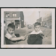 Photo of two children in a pram (ddr-densho-483-809)