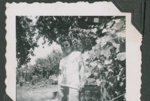 Man stands outside (ddr-densho-471-179)