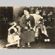 Hiroshi Saito's wife and daughters playing with dolls (ddr-njpa-4-2539)