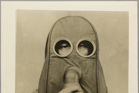 Man wearing a gas mask (ddr-njpa-13-242)