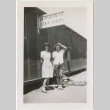 Two women standing in front of the Department of Education barracks (ddr-manz-7-106)