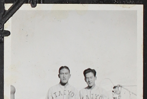 Two men in baseball uniforms on ship (ddr-densho-326-96)