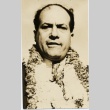 A man wearing leis (ddr-njpa-1-1367)