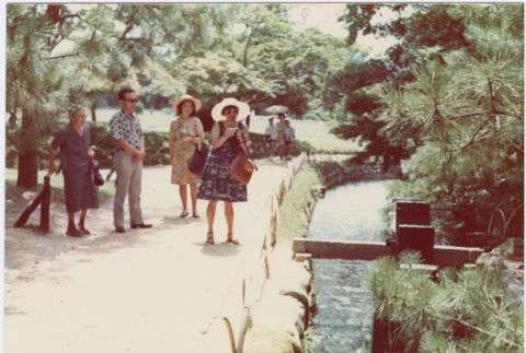 A group at a Japanese garden (ddr-densho-338-39)