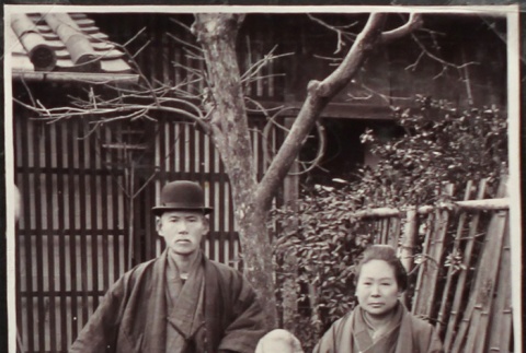 Married couple and mother in Japanese garden (ddr-densho-259-130)