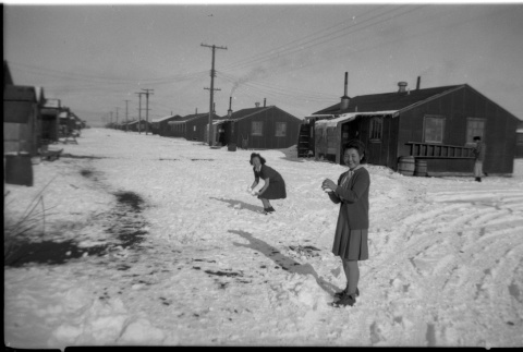 Jeanette Nishimura & Matsuye Takeuchi making snow balls (ddr-densho-570-63)