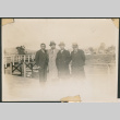 Four men on a boardwalk (ddr-densho-433-795)