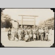 Group portrait in front of torii in Japan (ddr-densho-259-292)