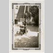 Two children on a scooter (ddr-densho-391-9)