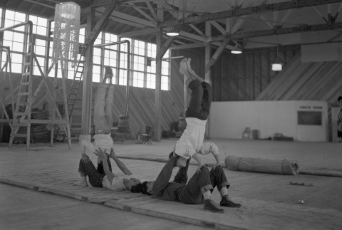 High school students doing acrobatics (ddr-fom-1-537)