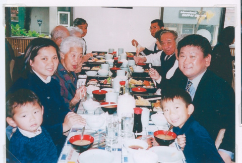 Family funeral luncheon (ddr-densho-477-793)