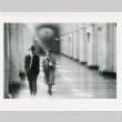 Man and woman walking through a hall (ddr-densho-1007-390)