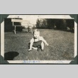 Baby girl on grass (ddr-densho-321-15)