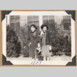 Smiling girls holding hands (ddr-densho-542-186)