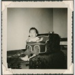 Baby in a child's seat (ddr-densho-321-1037)