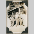 Four people resting on bench (ddr-densho-383-125)