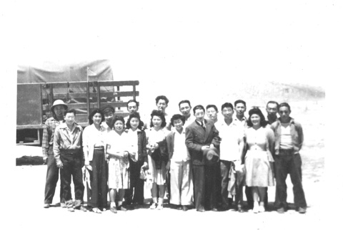 Group of Japanese Americans in camp (ddr-densho-157-11)