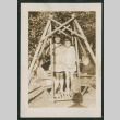 4 kids on a wooden swing (ddr-densho-378-367)