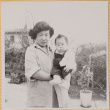 Yoshiko Shiomi holding Susan Shiomi (ddr-densho-522-165)