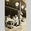A couple and another man posing (ddr-njpa-1-1553)