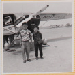 Two boys by airplane (ddr-densho-522-256)