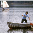 Stuart Wong trying to retrieve a bag in the water (ddr-densho-336-879)