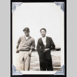 Tokeo Tagami and another man lean against the rail of a ship (ddr-densho-404-91)