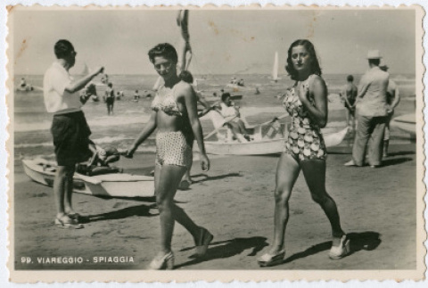 Women in swimwear walking along beach (ddr-densho-368-110)