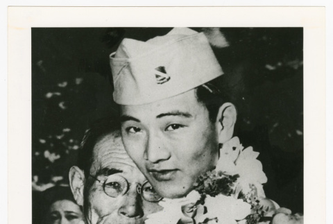 Two hugging (ddr-densho-1007-252)