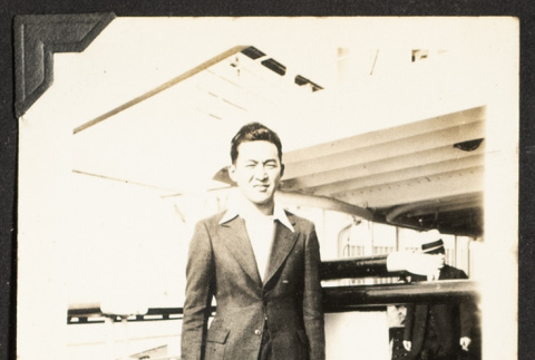 Taku in a suit (ddr-densho-542-377)
