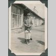 Man and girl on sidewalk (ddr-densho-316-372)