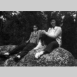 Betty Wake and Lilyan Nagata sitting on a rock (ddr-densho-336-8)