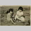 Two sisters on a beach (ddr-densho-113-15)