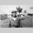 Serviceperson outside tents (ddr-densho-1007-61)
